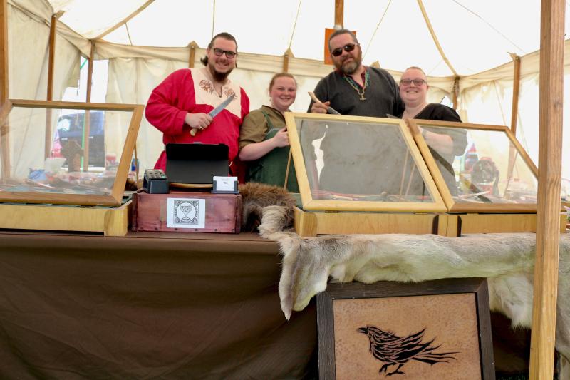 The Tempered Raven specialized in handmade and hand-forged knives. Confident in his abilities, Jacob Armagost crafts high-end knives as well as more affordable versions and provides customers with detailed care instructions for their purchases. See their work at temperedraven.com Shown are (l-r) Sean Cronin, Melanie Cronin, Armagost and Candace Demuth. AARON MUSHRUSH PHOTO