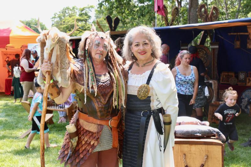 Cheryl Wright, left, and Keyla Rivero-Rodriguez braved the hot day to create a more authentic experience for festival goers. AARON MUSHRUSH PHOTO