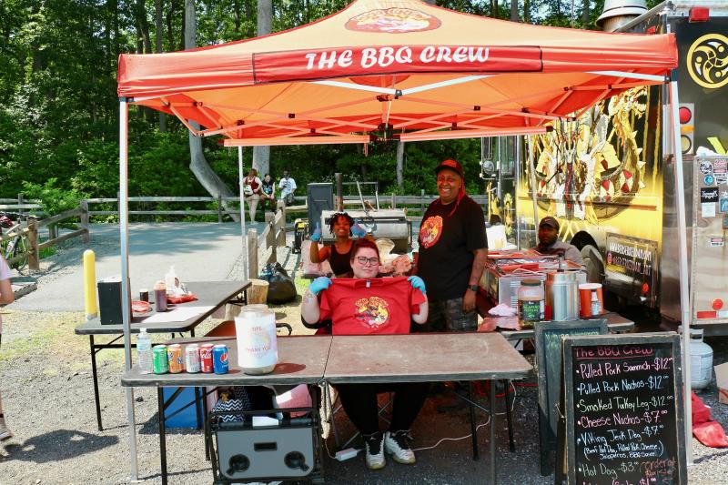 The BBQ Crew was serving up special hot dogs topped with shredded pulled pork, nacho cheese, and jalapeños. From a personal perspective, it made for a great afternoon lunch. Shown in back are (l-r) Amayah McClellan and Daunte Harper. In front are Sarah Joyner and Ena Vegas. AARON MUSHRUSH PHOTO