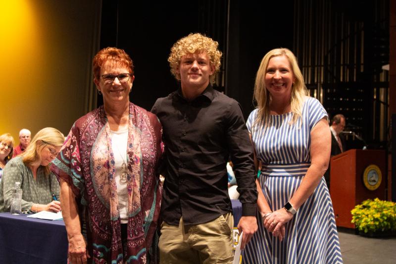 Andrew Schaen received the F.H & L.O. Russell Scholarship, Mark P. Whitford Foundation Scholarship Award and Ursinus Gateway Scholarship. Shown are (l-r) Gail Shaffer, Schaen and Principal Kristin DeGregory.
