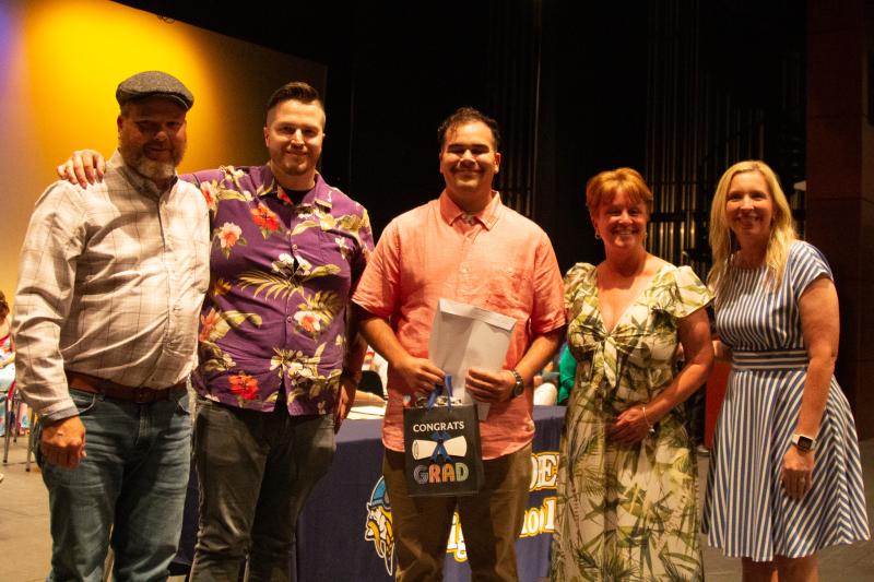 Javier Valcarcel-Oquendo received the Charles Maxwell Memorial Scholarship, given in memory of Charles Maxwell, Class of 2020, who passed away in February after an auto accident. Shown are Charles’ father Chuck Maxwell, brother Dylan Rosenberg, Valcarcel-Oquendo, mother Lauri Maxwell and Principal Kristin DeGregory.