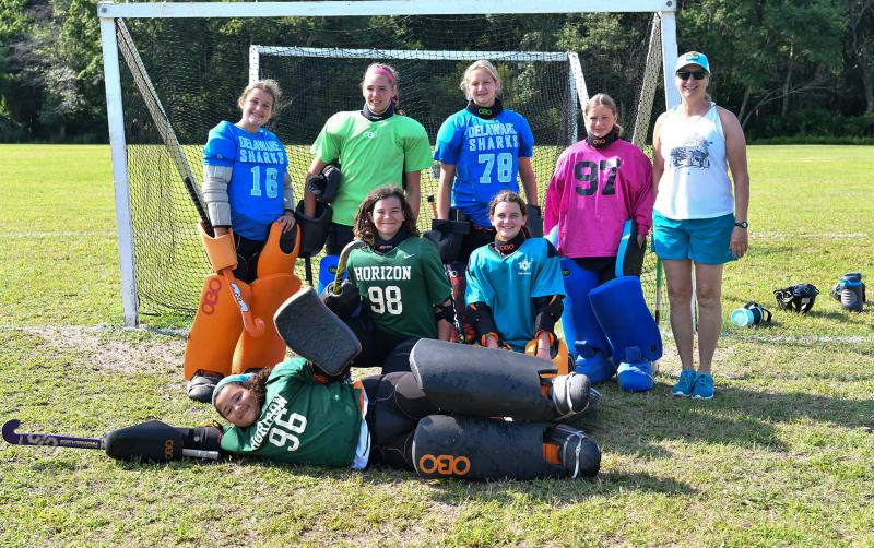 Goalies at the camp are in back (l-r) Hartley Haines, Lila Kennedy, Cara Smith, Maddie Paret and coach Lori Miller. Kneeling are JC Bernett and Abagail Lake, with Zula Pollard down in front.