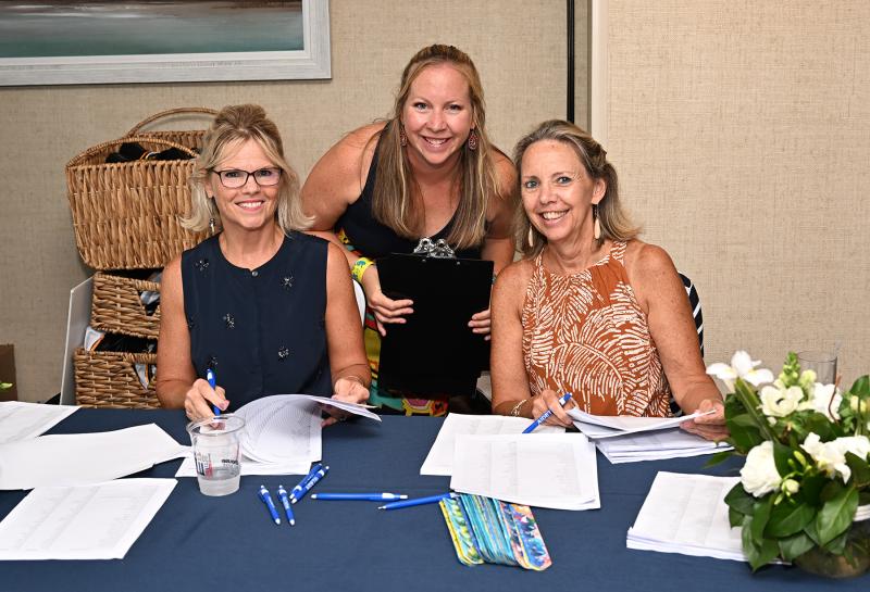 Checking in attendees are (l-r) Wendy Smith, executive assistant at Beebe Medical Foundation; Amy Keller, event coordinator at Beebe Medical Foundation; and Karen Duffield, annual fund and grants coordinator at Beebe Medical Foundation.