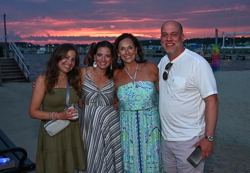 Enjoying the beautiful sunset outside Lighthouse Cove are (l-r) Jen Abessinio, Susan Elder, Ava Cannon and Vince Abessinio.