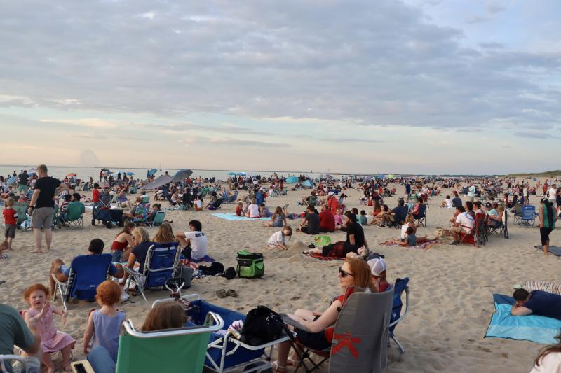 People set up on the beach early to enjoy a beautiful evening on the sand in anticipation of the big fireworks show. BILL SHULL PHOTO