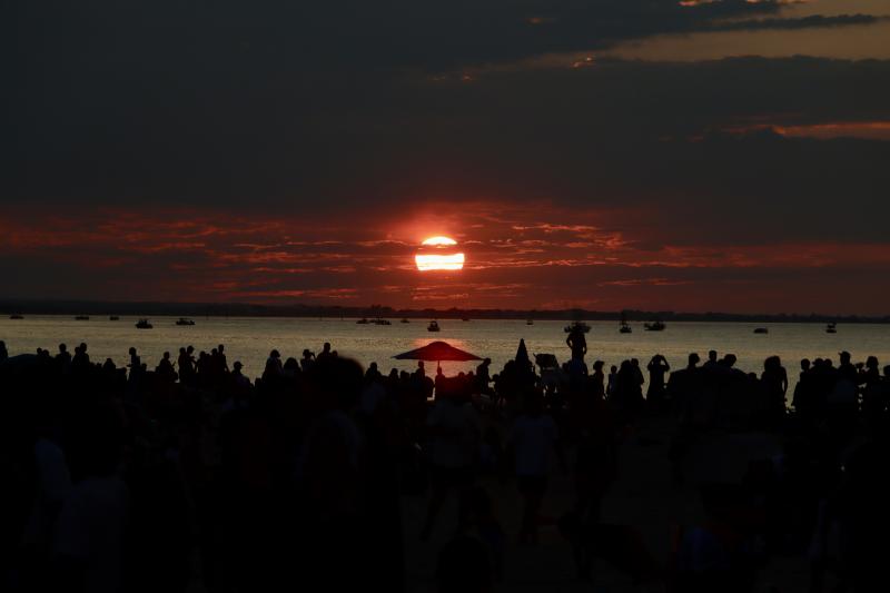 A spectacular sunset over the bay precedes the Lewes fireworks display on Savannah Beach. BILL SHULL PHOTO