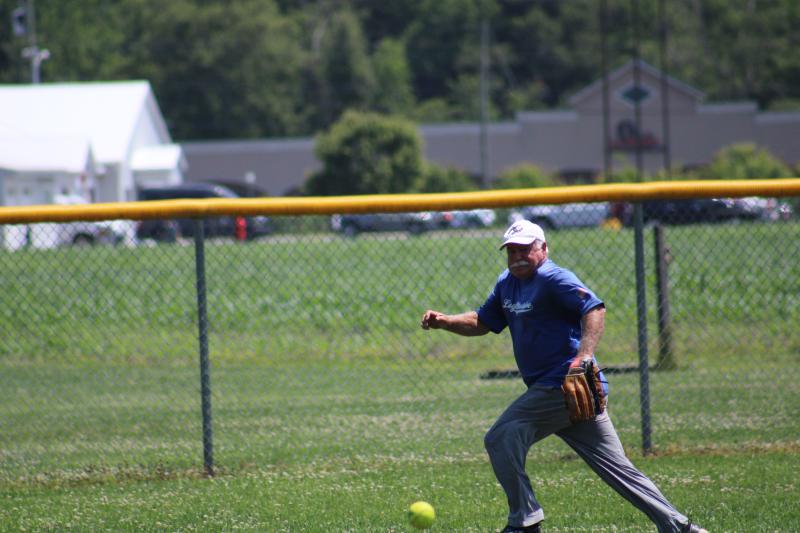 Logo Motive’s Mike McClatchey chases down a ball hit into the gap. The eventual relay would lead to the final out of the game, clinching an 11-10 victory for Logo Motive.