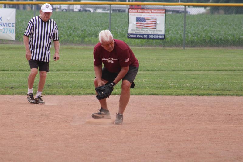 Phoenix Physical Therapy’s Butch Grover begins to turn the key on a double play June 20 against Giant of Millville.