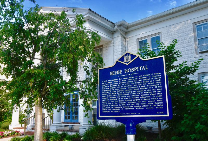 A marker stands in front of the Beebe Hospital Shaw Building dating back to 1921 to replace the original small facility founded by the Beebe brothers in 1916. Beebe was the first hospital in Sussex County.