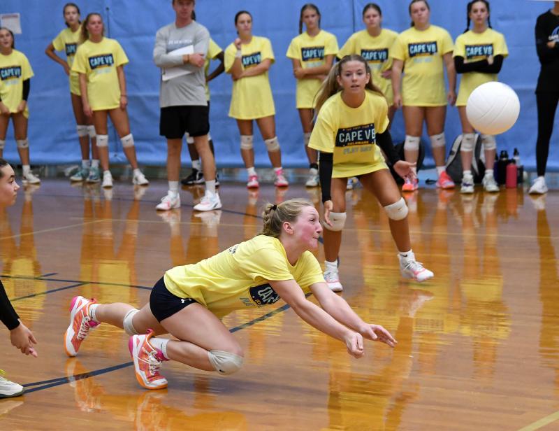 Junior Ava Calciano bumps a return for the Vikings.