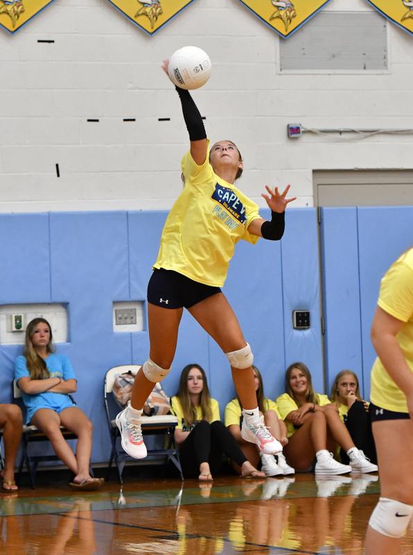 Cape sophomore Rylee Ockels powers in a jump serve.