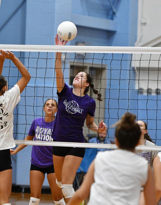Royals senior Addy Benjamin taps over a kill shot.
