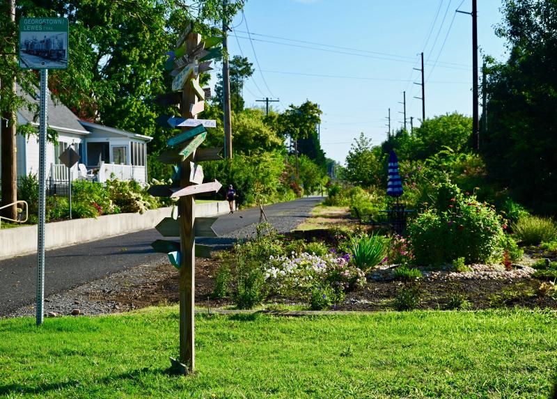 The trail is not only for cyclists and walkers, but also for those who live along it in Lewes. Homeowners between Jefferson and Monroe streets spend hours landscaping their yards along the trail.