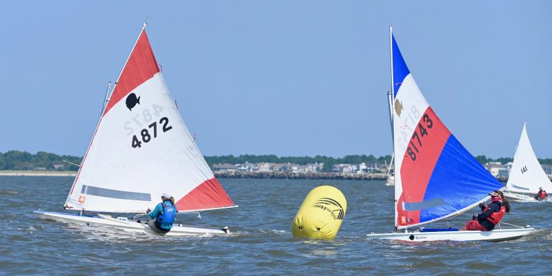 Kimmy Jackman (4872) of Bantam Lake Yacht Club in Morris, Conn., and Kerry Gendron (81743) of One-15 Brooklyn Sailing Club in New York round a mark. Gendron finished in fourth place and Jackman in 11th place.