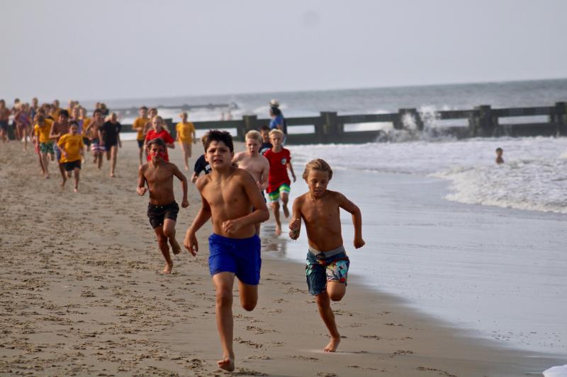 Dewey Beach Patrol junior lifeguards Malec Ksebe and Gus Lantz lead the way during the beach run. They finished first and second, respectively.