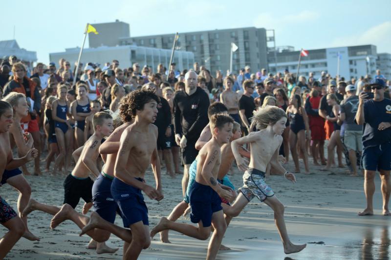 Rehoboth Beach in front of Virginia Avenue is packed with supportive family and friends of junior lifeguards.
