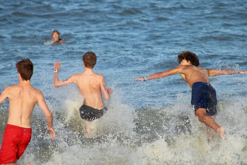 There a quite a few methods for entering the water, none of which involve remaining dry and sand-free.