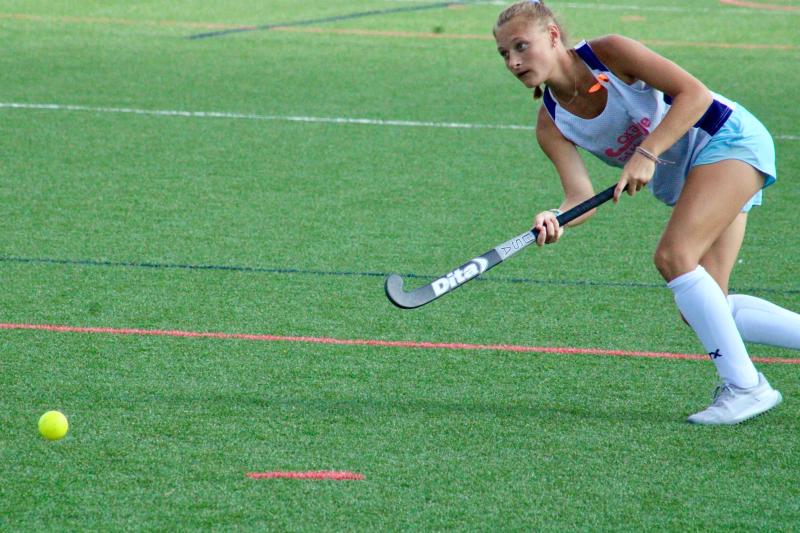 Freshman Meredith Schiff connects with a teammate as the Lady Seahawks work on generating offense using through passes.