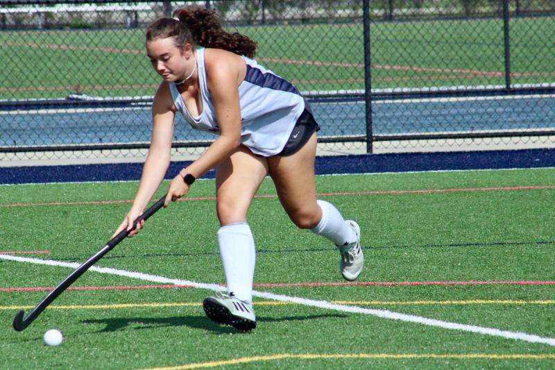 Junior defender Madison Jones corrals the ball in before centering it to a teammate in front of the goal.