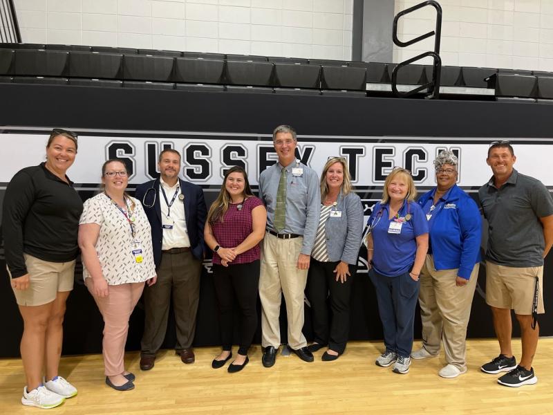 Sussex Tech High School and Beebe Healthcare sports physical clinic collaborators shown are (l-r) Heather Heidel, Sussex Tech athletic trainer; Angela Scott, RN; Dr. Bill Chasanov; Jessica Riffle, NP; Dr. Eric Hale; Danielle Socrates, Beebe vice president of value-based care; Colleen Dudlek, RN; Rosella Gray, RN; and Mark Quillin, Sussex Tech athletic director. SUBMITTED PHOTO