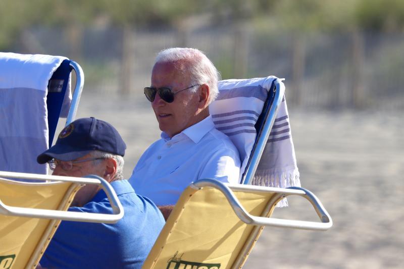 President Biden sports his usual aviator sunglasses during his visit to the beach Sunday afternoon. The Bidens spent about 60 hours in Rehoboth Beach this visit.