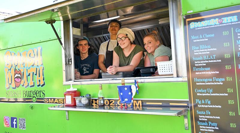 Serving up food from the Smash Mouth food truck are (l-r) Jacob Roberts, Stephen Aguirre, Jamie Davis and Ashley Hartford.