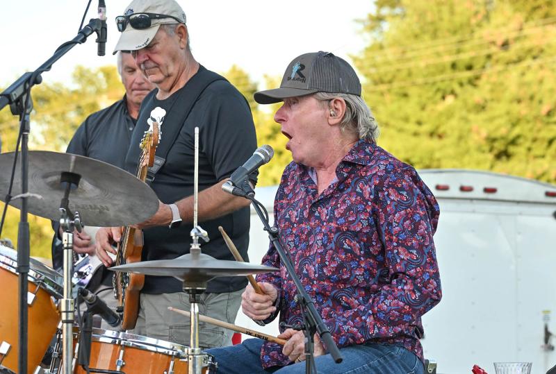 Cape Community Fund co-founder Ed Shockley keeps the beat for The Funsters while Dickie Messick holds down the base line.