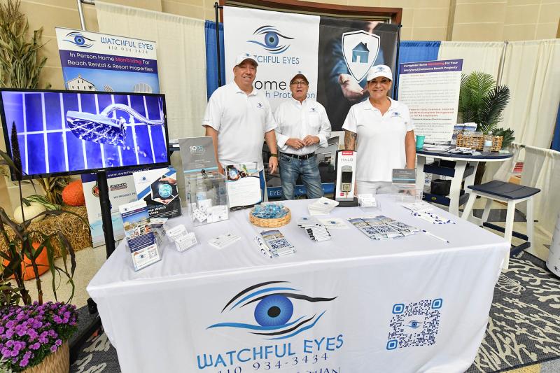 Event sponsor Watchful Eyes, a property-monitoring company, offers valuable information for the resort area. Shown at the booth are (l-r) Mark Ventura, Robert Tarnoski and Nicole Iannucci.