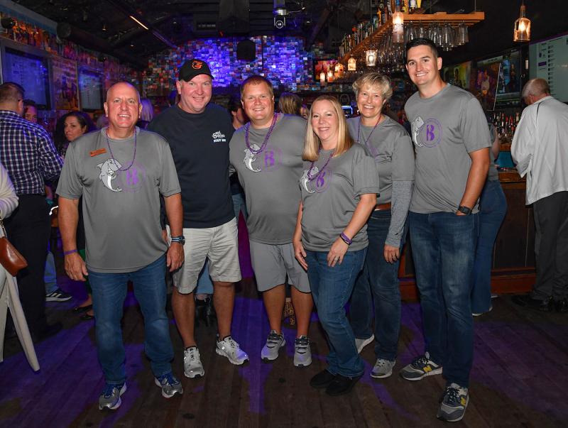 The Starboard in Dewey Beach hosted the Beebe Goes Purple fundraiser Sept. 28, where guest bartenders served up libations and a fun time. Members of the Beebe Medical Foundation team on hand for the event are (l-r) Tom Protack, Starboard owner Steve “Monty” Montgomery, Justen Albright, Amy Keller, Kay Young and Sean Flanigan. DAN COOK PHOTOS