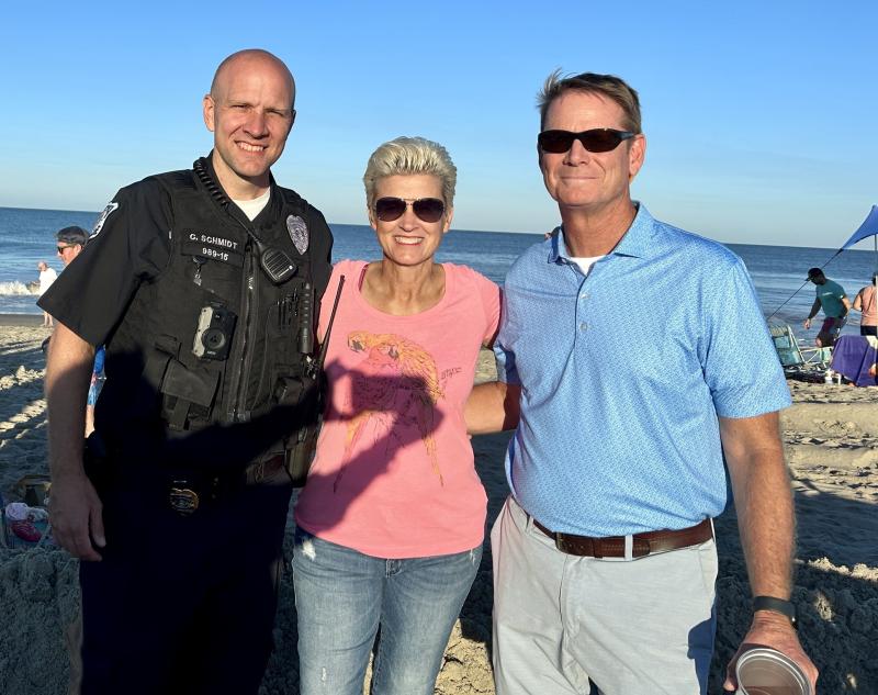 Dewey Beach Police Sgt. Colin Schmidt, left, visits with Police Chief Constance Speake and Town Manager Bill Zolper. ELLEN DRISCOLL PHOTO