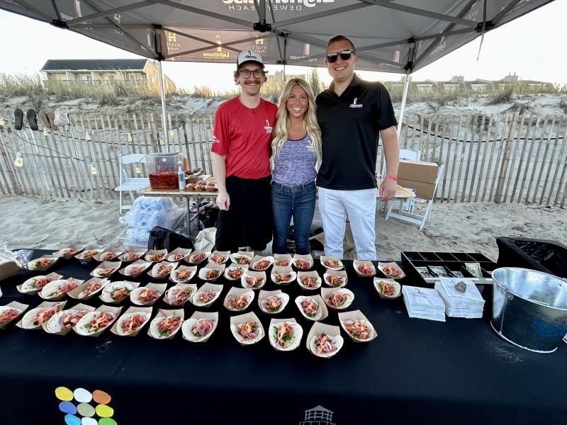 Serving up spicy tuna tacos are (l-r) Lighthouse Kitchen Manager Roman Lipinski, Lighthouse General Manager Stevie Wishner and TKO Hospitality Vice President of Operations Drew DiFonzo. ELLEN DRISCOLL PHOTO