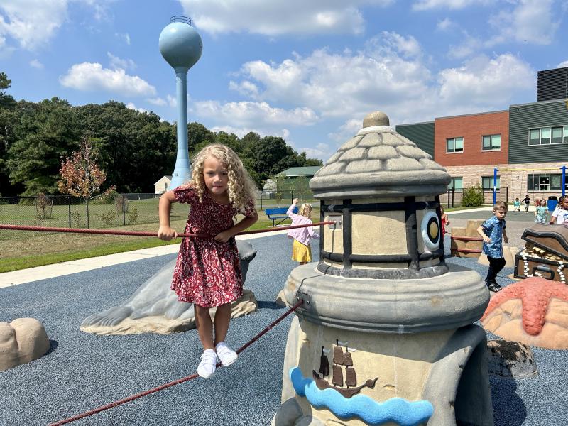 H.O. Brittingham kindergartener Ammy Chavez-Ramirez is determined to get across the balance ropes. ELLEN DRISCOLL PHOTO