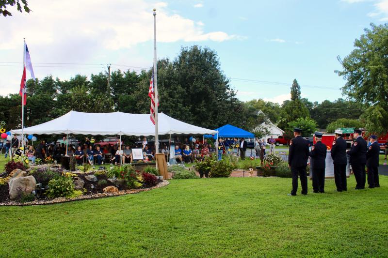 Although it rained during the ceremony, the tent was full of people paying tribute to those who lost their lives Sept. 11, 2001, or as a result of the aftermath and cleanup.