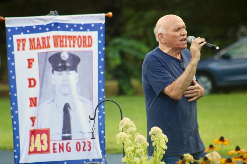 Vinny Verdisco was working in transit when the planes struck the Twin Towers. Having just completed a night shift, his wife woke him up an hour after he had come home and gone to sleep. Verdisco helped make sure people got to where they needed to be. He has health problems related to the air toxicity at Ground Zero.
