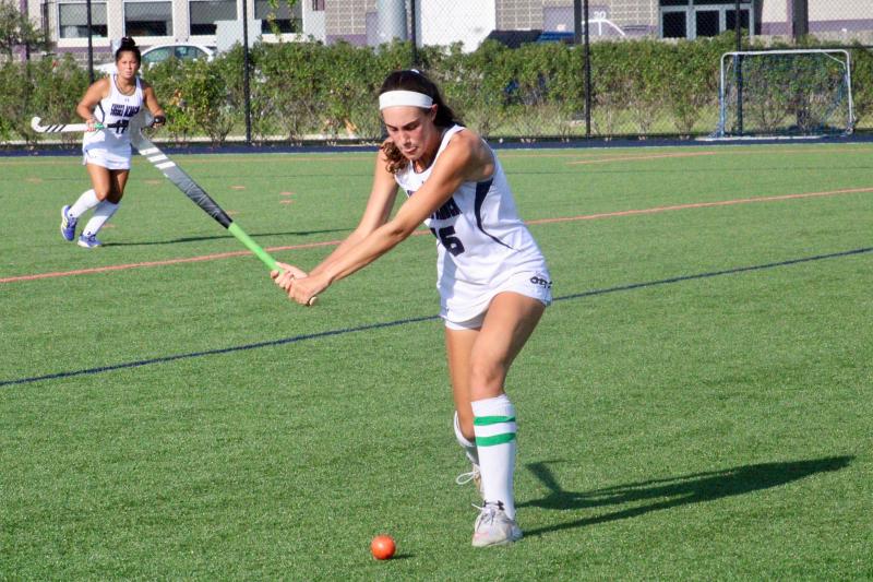Seahawks’ Shelby Manlove clears the ball out of Sussex Academy’s half and deep into Smyrna territory.