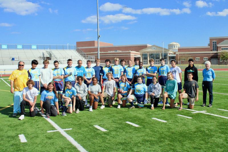 The Cape Henlopen unified flag football team had its season opener Sept. 20 against Henlopen North rival Caesar Rodney. Prior to the game, the team gathered for its yearbook photo. (L-R) Back row: Coach Messick, Ronnie LeRoy, Harry Preston, Vlad Ticala, Randolph Adams, Alejandro Alvarez-Roman, Luke Pickard, Mason Furman, Jerome Kochinsky, Ethan Carney, Jackson Wood, Connor Pencek, Will Mastrangela, Noah Ryan, Aidan Block, Garrett Thawley, Isaiah Magathan, Kayden Gibbs, Coach McCloy Front Row: Ethan Willey, Mallory Kauffman, Peyton Lamson-Reich, Noah Wilson, Casiya Chandler, Ellis Jack, Maddie Mastriana, Sophia Adams, Mackenzie Leos, Chloe Wood, Dalen Daminger AARON MUSHRUSH PHOTOS