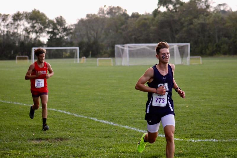 Seahawks junior Harrison Dabbs is in front of Laurel’s Landen Messick roughly halfway through the race. He maintained his lead and finished fifth overall at 19:27.1