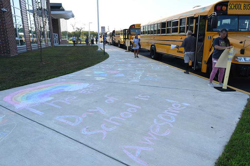 The Milton Elementary PTO encouraged students and parents to leave positive and welcoming messages on the sidewalk outside the school. NICK ROTH PHOTO