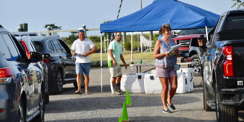 Theresa Sage, right, has developed a strong rapport with their customers since they started pop-up sales in 2020. Sales take place at Riverside Business Park & Marina at the end of Pilottown Road in Lewes.