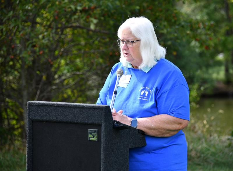 Terri Wyatt, retired Beebe Healthcare pregnancy loss grief counselor, welcomes the attendees to the walk and tells of the importance of Pregnancy and Infant Loss Awareness Month.
