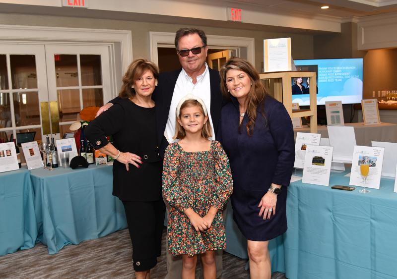Honorary chairs for the event were Debbie Reed and Ashlee Reed Hidell. Shown in back are (l-r) Debbie Reed, Bob Reed and Ashlee Reed Hidell, with Margot Hidell in front.