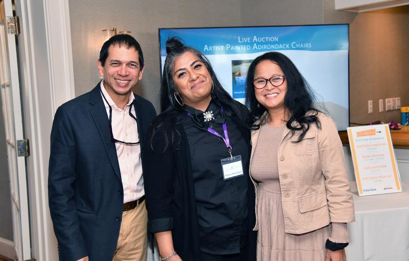 Smiling for the camera are (l-r) Dr. Joydeep Haldar, Monica Mandujano and Dr. Maria Haldar.