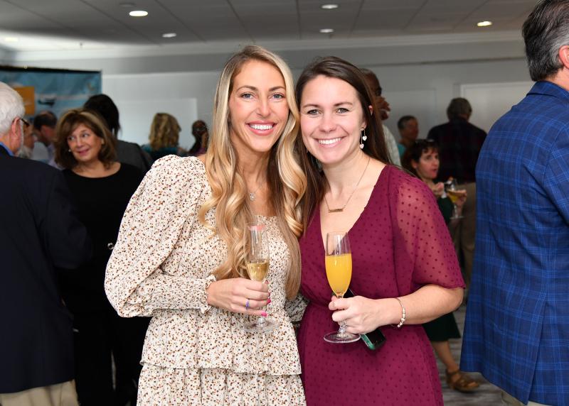 Having a great time at the mixer are Jill Geyer, left, and Taylor Neeley.