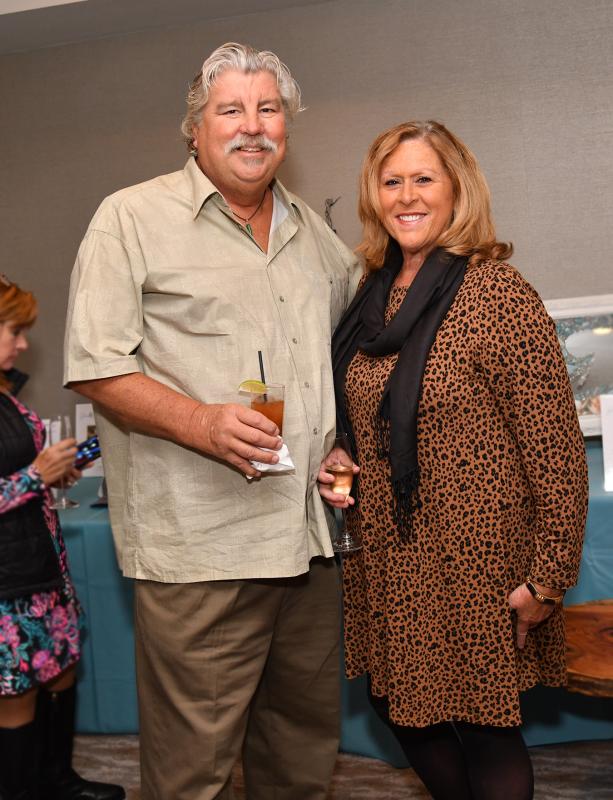 Mike and Sandi Walker smile for a picture at the mixer.