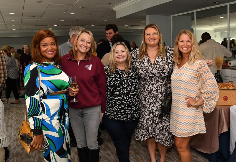 Chatting during the welcome reception are (l-r) April Armstrong, Nina Peery, Jennifer Antonelli, Michelle Bergold and Melissa Clampitt.