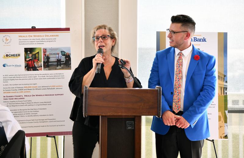 Maria Fraser from The Café on 26 and Matt Rice from Fulton Bank explain the purpose of the brunch.