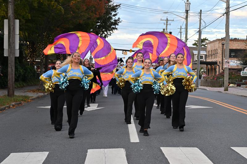 Dance team captains Adria Windish, left, and Bella Petka lead the band up Savannah Road in the Cape Henlopen Homecoming Parade. DAN COOK PHOTOS