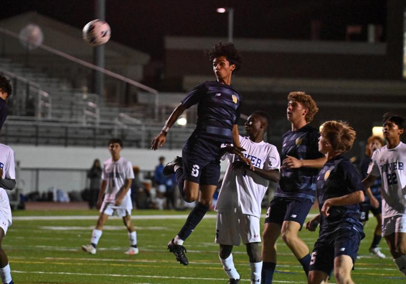 Cape senior Angel Haro-Simental heads a shot in the second half of the Senators’ win over the Vikings.