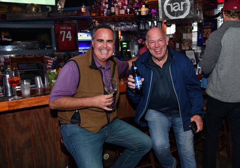 Former Sen. Ernie Lopez, left, and Rep. Pete Schwartzkopf, D-Rehoboth Beach, former House speaker, enjoy a drink at the event.
