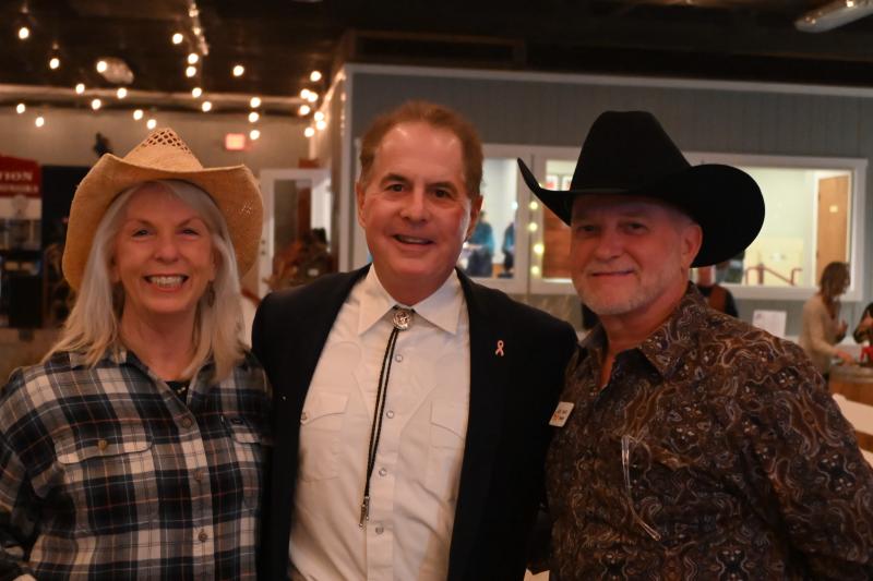 Sharing a moment at the party are (l-r) SDTR Executive Director Jo Allegro-Smith, Sussex County Councilman Mark Schaeffer and SDTR Executive Committee President Scott Swingle.